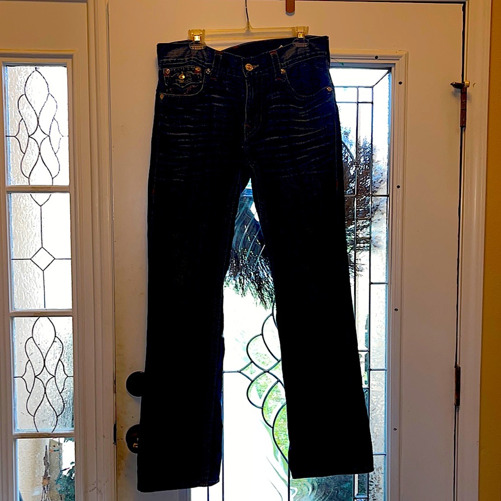 2 pair of jeans 1 dark and 1 light denim price is 25.00or 50.00 for both